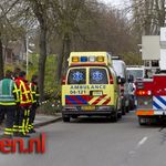 Persoon met hoogwerker uit woning gehaald