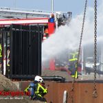 Gas- en zuurstofflessen in brand op Genuakade