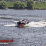 Brandweer rukt met boot uit naar buitenbrand