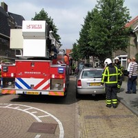 Klein brandje in dakgoot woning Emmastraat