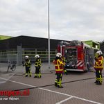 Container met papier in de brand gestoken