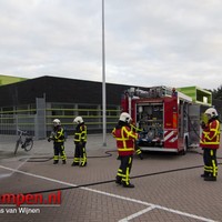 Container met papier in de brand gestoken