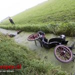 Koets en paarden te water bij optocht: 1 gewonde