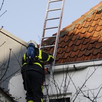 Schoorsteenbrand bij woning Voorstraat Kampen