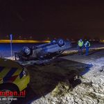 Auto over de kop Baron Bentinckweg Kamperveen