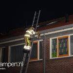 Kat in dakgoot in de De Bruynstraat